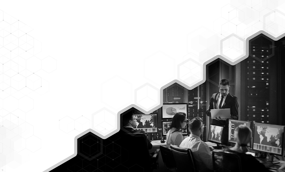 Split image of white hexagon pattern with Fastfrate Group employees analyzing data in computer lab