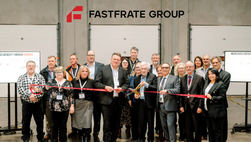 Fastfrate Group staff cutting ceremonial ribbon