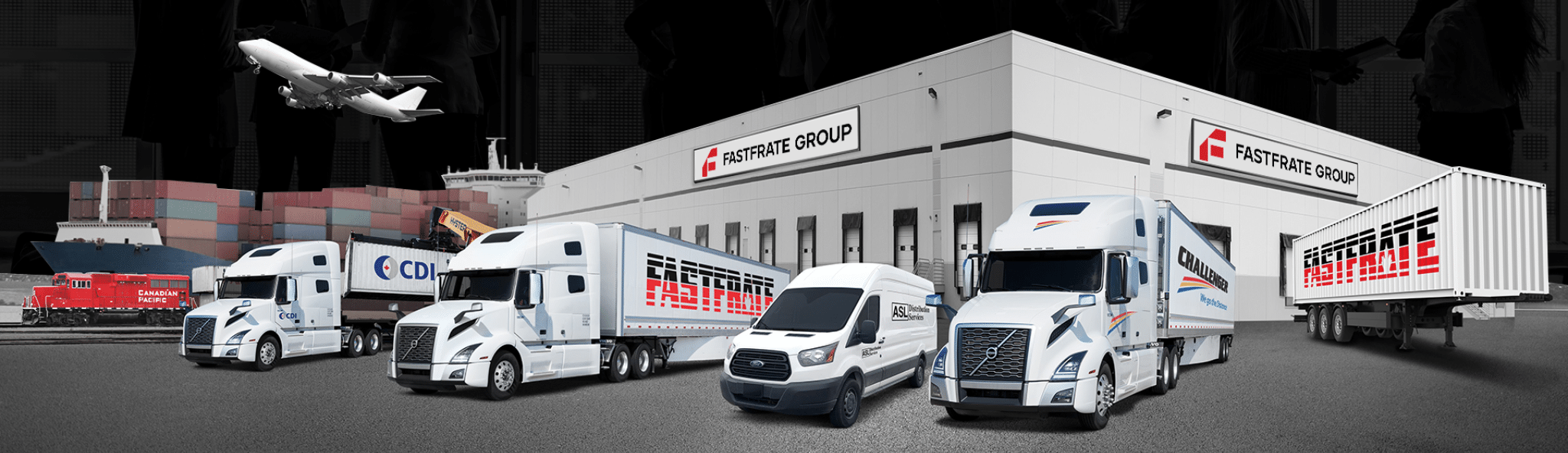 Fastfrate group trucks in front of a warehouse
